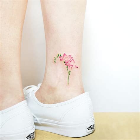 22 Beautiful And Delicate Freesia Tattoo Designs Tattooadore