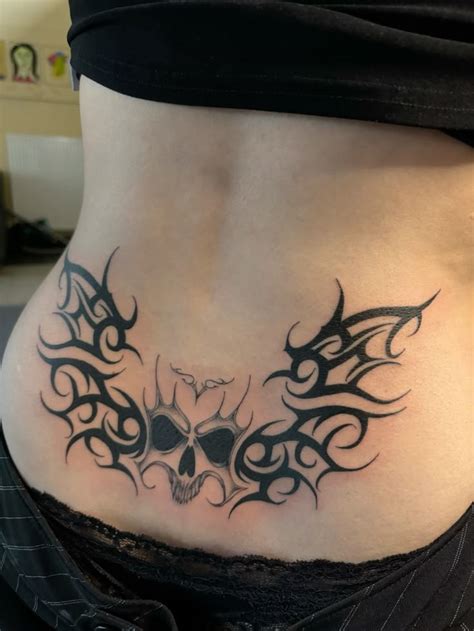 23 Tramp Stamp Tattoo Ideas 2025 For Women Cute Gothic Tribal 23 Tramp Stamp Tattoo Ideas 2025 For Women Cute Gothic Tribal