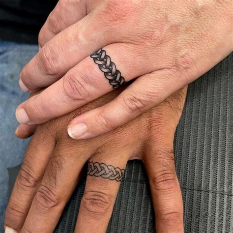 26 Fabulous Wedding Ring Tattoos That Show You Believe In Love Forever 26 Fabulous Wedding Ring Tattoos That Show You Believe In Love Forever