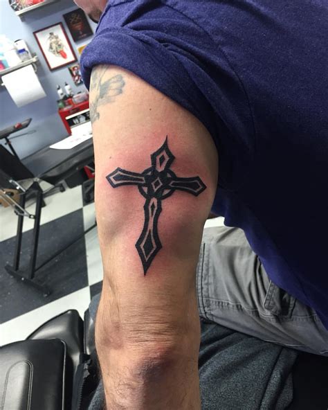 30 Striking Tribal Cross Tattoo Designs Just For You 2024 30 Striking Tribal Cross Tattoo Designs Just For You 2024