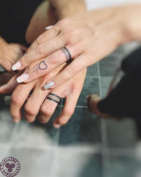 30 Unisex Wedding Ring Tattoos For Couples Ring Finger Tattoos Ring