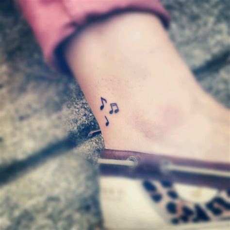 32 Cool Music Note Tattoo Ideas