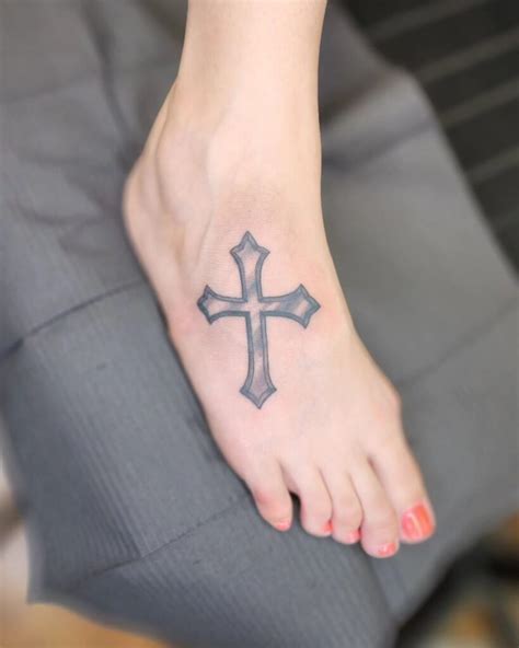 361 Tattoo Of A Cross Stock Photos High Res Pictures And Images Getty Images