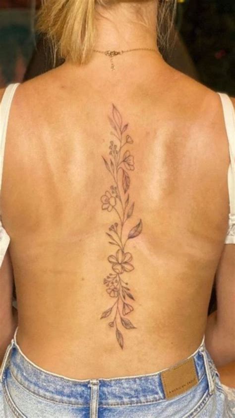 A Simple Floral Vine Spine Tattoo That Exudes Beauty Amp Elegance A Simple Floral Vine Spine Tattoo That Exudes Beauty Amp Elegance