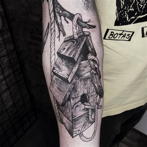 Birdhouse Tattoo Located On The Inner Forearm