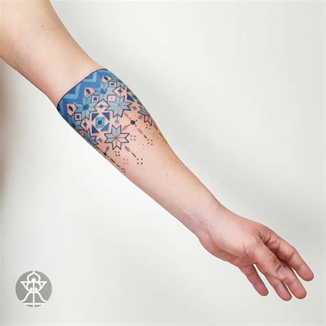 Blue Pattern Tattoo On The Forearm Tattoogrid Net