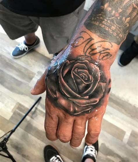Flower Hand Tattoo Male At Sabrina Swensen Blog