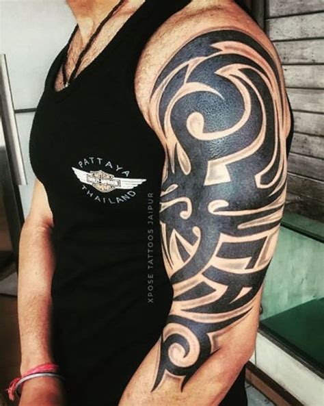 Half Sleeve Tribal Tattoo Tribal Back And Half Sleeve Tattoo