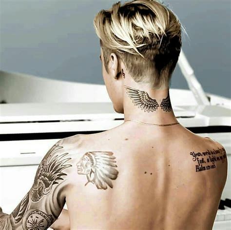 Justin Bieber Amp 39 S Wings Tattoo On The Back Of His Neck Justin Bieber Amp 39 S Wings Tattoo On The Back Of His Neck
