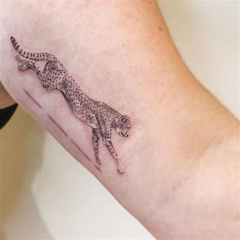 Micro Realistic Cheetah Tattoo On The Inner Arm