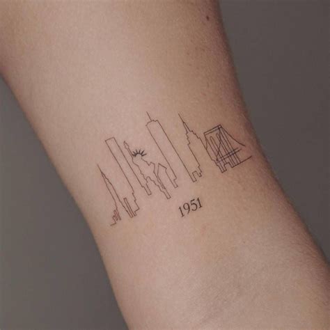 Minimalist Nyc Skyline Tattoo On The Bicep