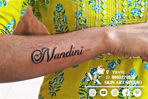 Nandhu Name In Cursive Tattoo Designs