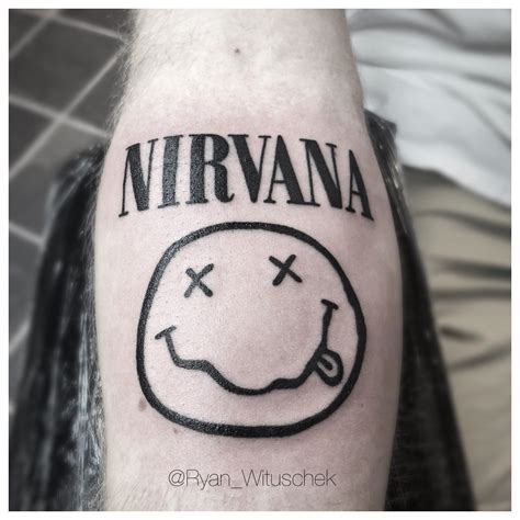 Nirvana Smiley Face Logo Tattoo
