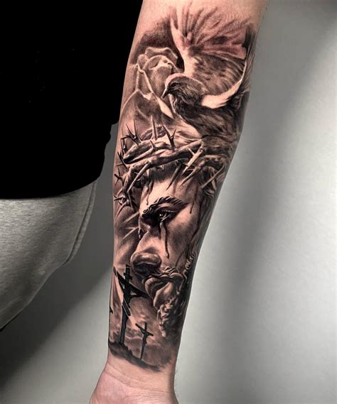 Religious Forearm Sleeve Tattoos