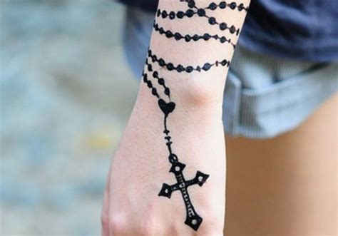 Rosary Tattoo Ideas And Designs For The Hand Arm And Body Tatring Rosary Tattoo Ideas And Designs For The Hand Arm And Body Tatring