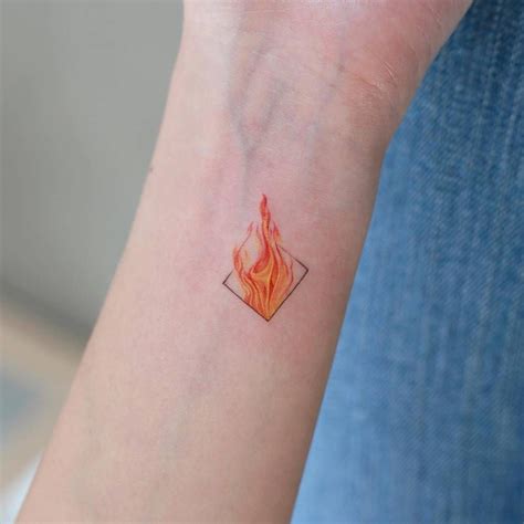 Small Fire Tattoo On The Wrist Tattoo Artist Doy Fire Tattoo Flame
