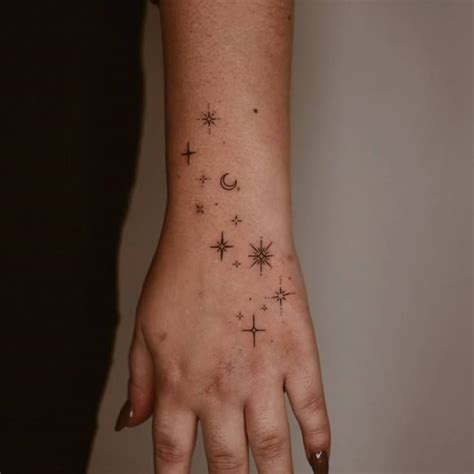 Stars And Moon Tattooed On The Wrist In 2024 Wrist Tattoos Star