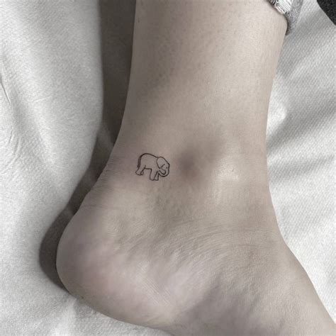 Top 10 Tiny Elephant Tattoo Ideas And Inspiration