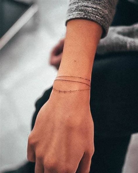 Top 100 Best Bracelet Tattoos For Women Wrapped Wrist Design Ideas Top 100 Best Bracelet Tattoos For Women Wrapped Wrist Design Ideas
