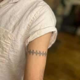 Top Band Tattoo Designs Chosen By Celebrities Their Meaning Holistic Ink