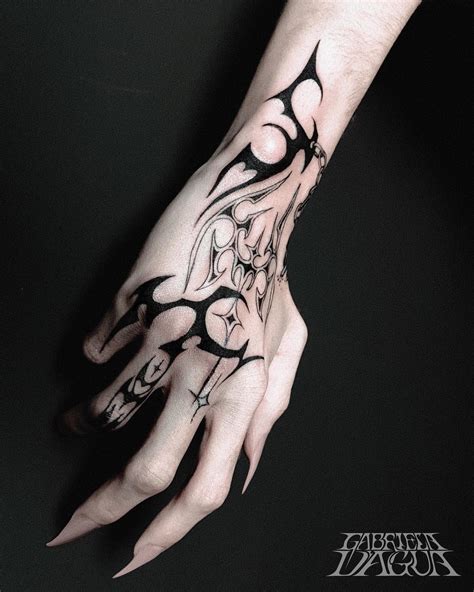 Tribal Tattoo Designs On Hand