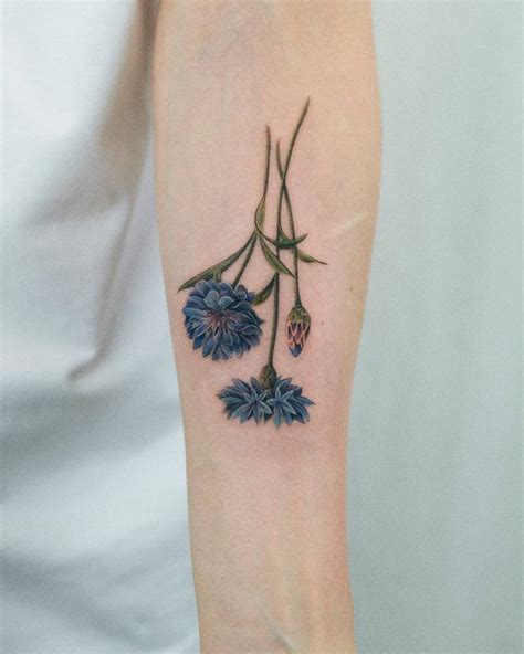 Watercolor Style Cornflower Tattoo Located On The Watercolor Style Cornflower Tattoo Located On The