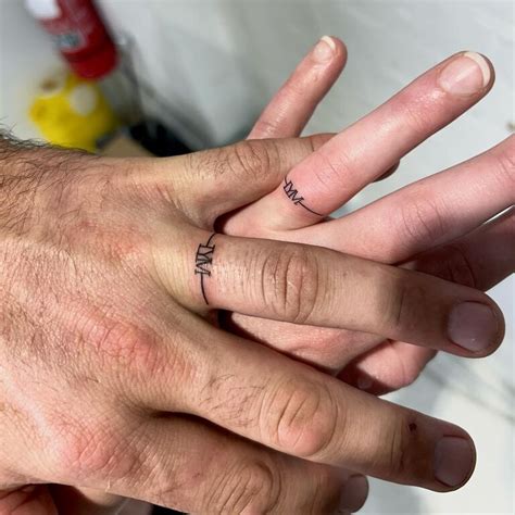 Wedding Band Tattoos With Names Intriguing Wedding Ring Tattoo Ideas